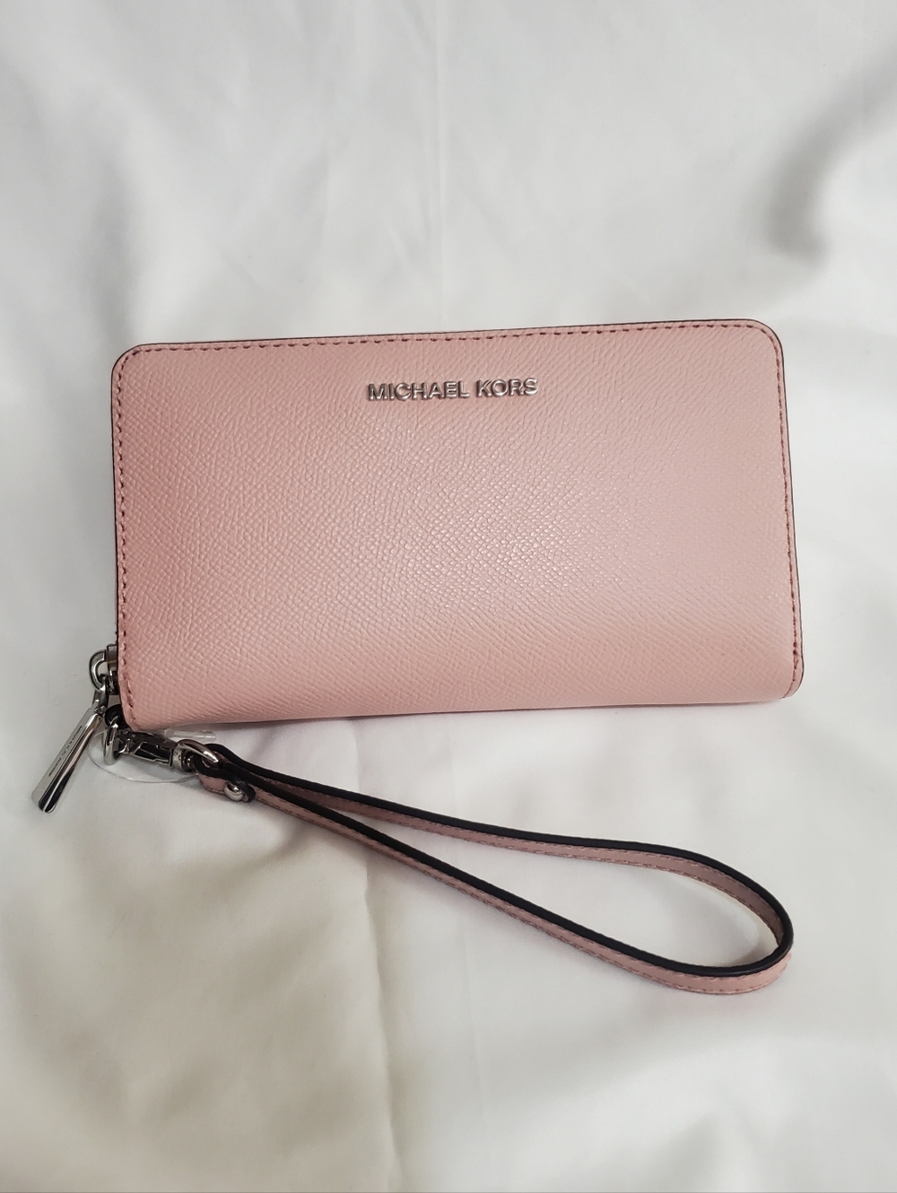 MICHAEL KORS Pale Pink Leather Wristlet with Silver Hardware